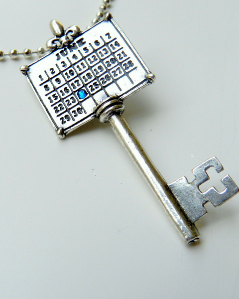 Silver plated Calendar Key with matching ball chain necklace