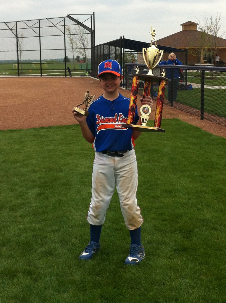 Scott holding the first 10U Diamond Kings Trophy along with his own trophy